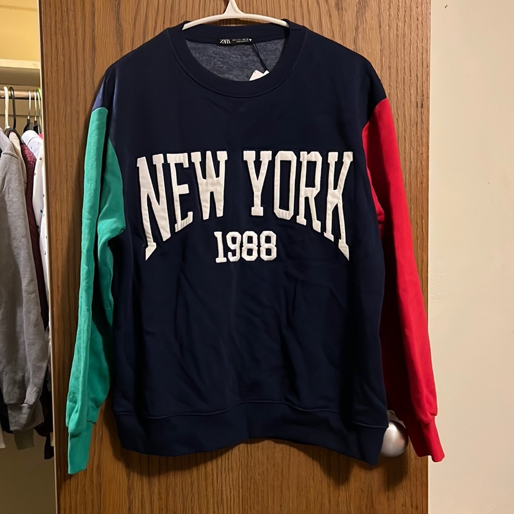 BrandNew sweatshirt from Zara. I usually wear a medium but it fits me perfect.